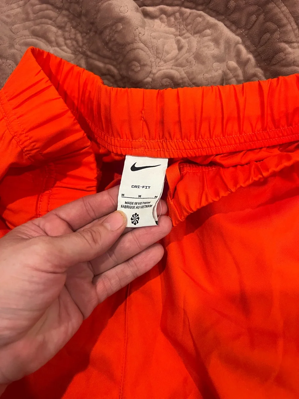 Nike Men’s Bright Orange Athletic Shorts with White Swoosh